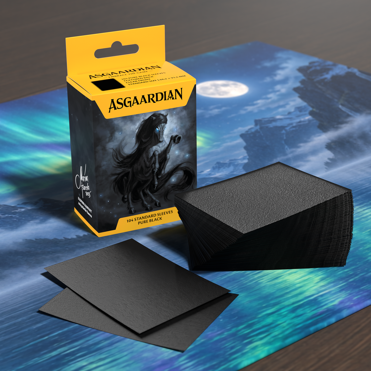 Asgaardian 1101 Pure Black standard card sleeves on a playmat: retail box of 104, a stack of sleeves and two loose sleeves
