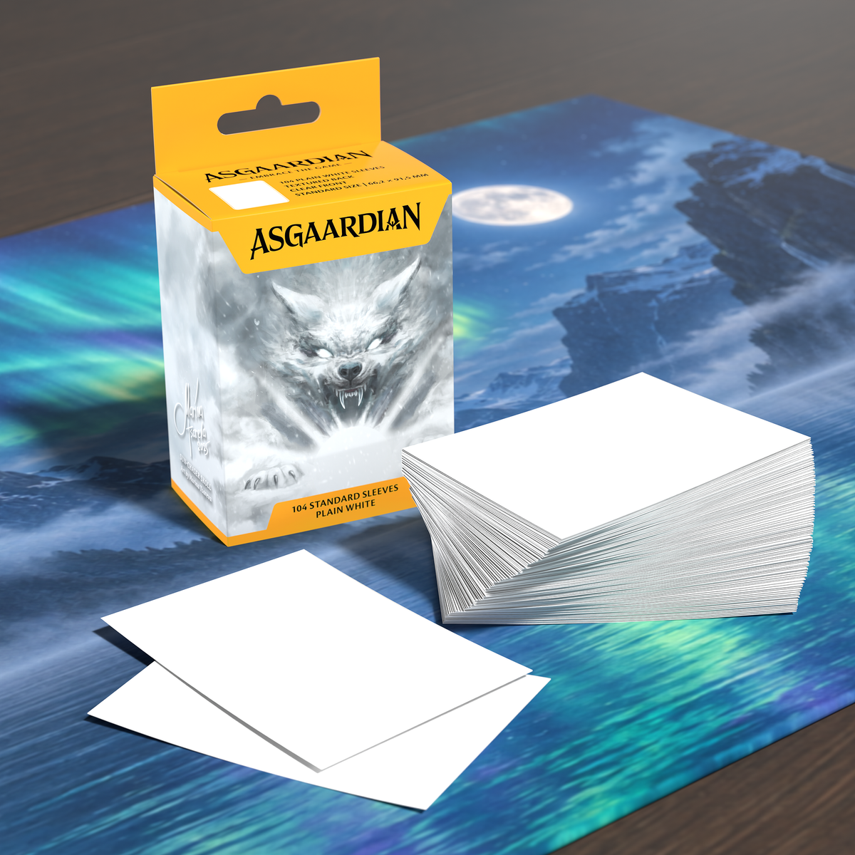Asgaardian 1105 Plain White standard card sleeves on a playmat: retail box of 104, a stack of sleeves and two loose sleeves